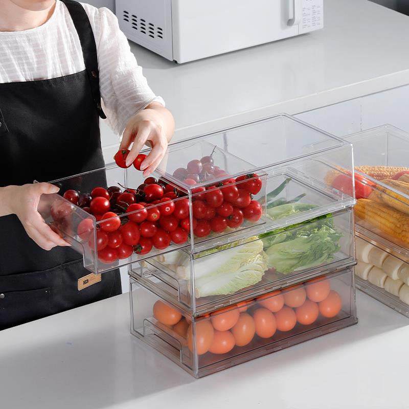 Kitchen Problem-Solvers: Clear storage containers for organizing fresh vegetables and fruits in the kitchen.