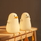 Little gull silicone night light with rechargeable battery and soft ambient glow