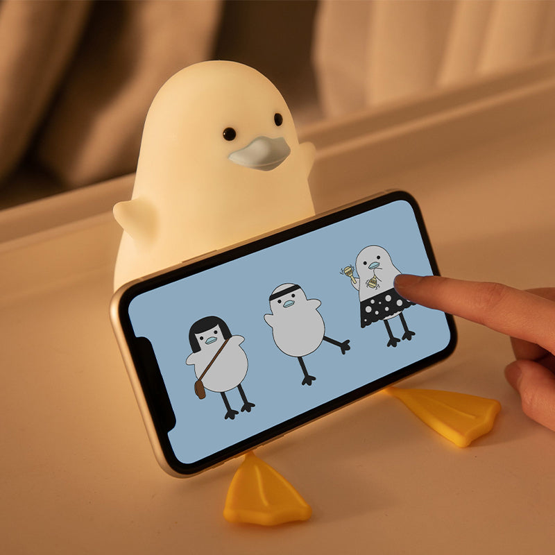 Little gull silicone night light with rechargeable battery and soft ambient glow